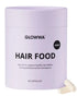 Purple container of GLOWWA Hair Food vitamins on a white background
