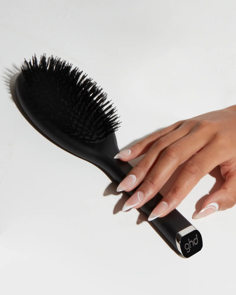 The Dresser Oval Dressing Brush